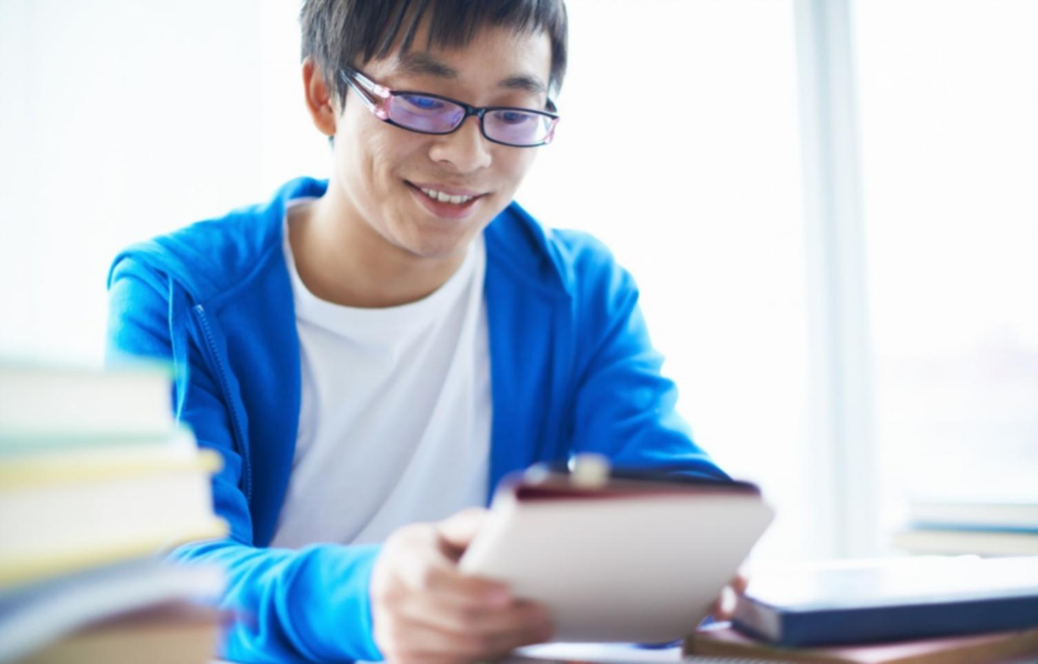 Students collaborating on financial literacy exercises